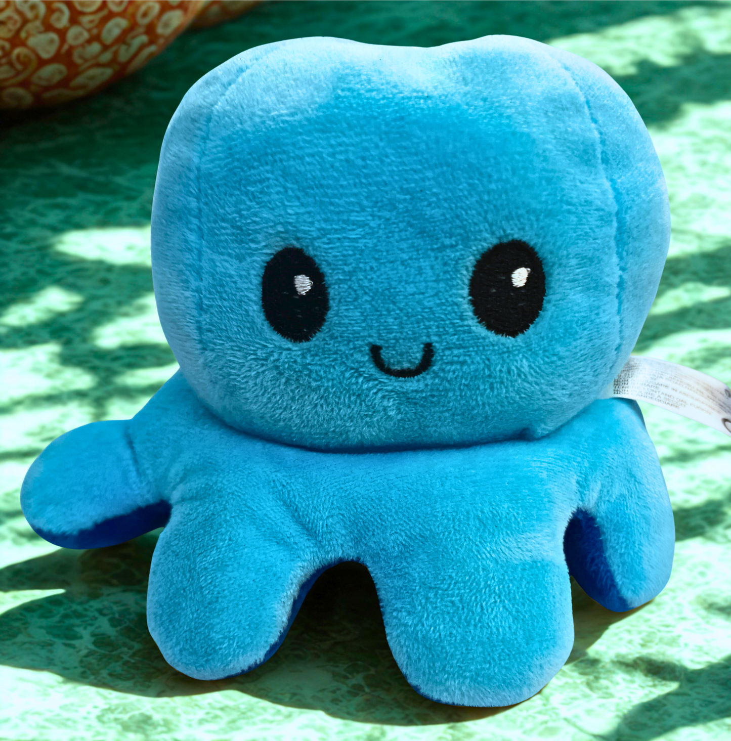 Reversible Mood Octopus Plush.